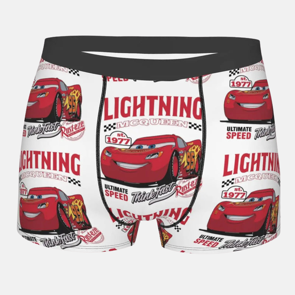 Boxer blanc pour enfant avec un motif de Lightning McQueen et l'inscription "Lightning", avec une ceinture élastique noire.