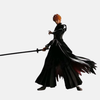 Vue de dos de la figurine Ichigo Kurosaki en Bankai, montrant son long manteau noir flottant et la chaîne rouge de son sabre.