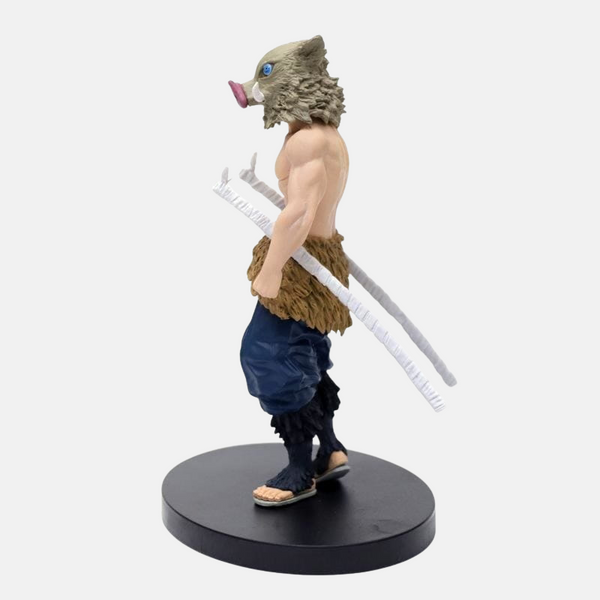 Vue de dos de la figurine de Inosuke Hashibira montrant sa musculature