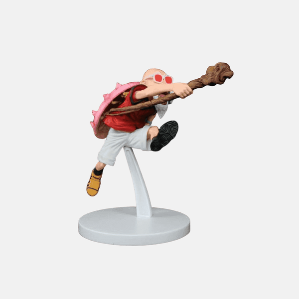 Vue de profil de la figurine Kame Sennin 15cm, montrant sa carapace rouge et son bâton.