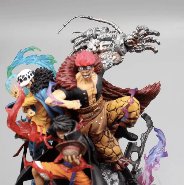 Vue de face de la statue de la Pire Génération, centrée sur Monkey D. Luffy.