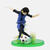Figurine de Meguru Bachira de Blue Lock en vue de trois-quarts, dans une pose de dribble survoltée, un grand sourire aux lèvres, illustrant son état de "Flow".