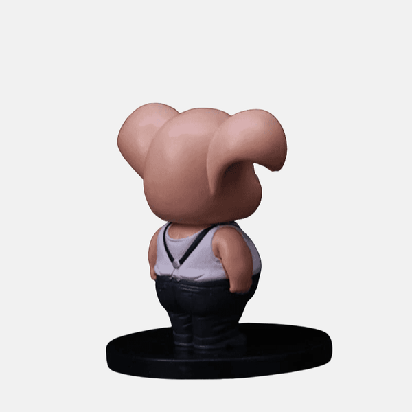 Vue de profil de la figurine Oolong 12cm de Dragon Ball Z, montrant son attitude boudeuse.