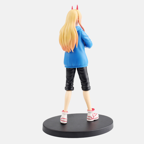 Figurine Power Hominidémon - Vue de profil montrant la veste bleue et les chaussures