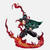 Figurine de Tanjiro Kamado de Demon Slayer exécutant la Danse du Dieu du Feu (Hinokami Kagura), entouré d'un vortex de flammes.