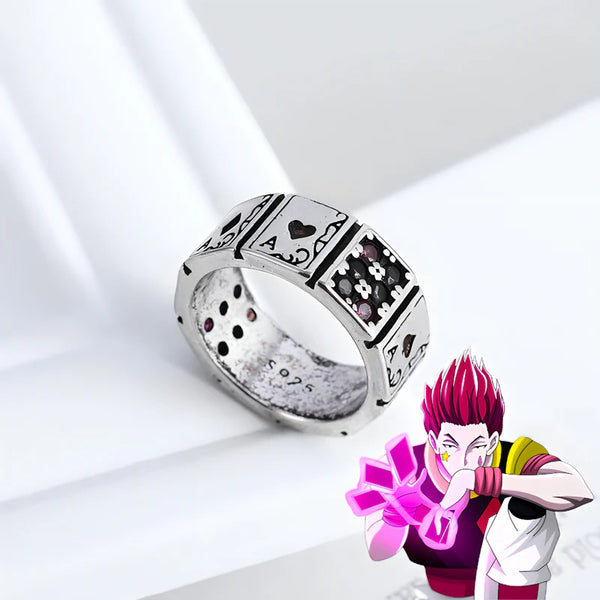 Bague Hisoka en titane posée avec accessoires et fleurs décoratives