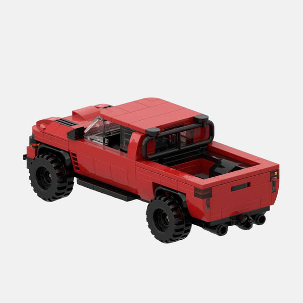 Vue de trois-quarts arrière du Dodge Ram 1500 TRX à construire, mettant en avant sa benne.