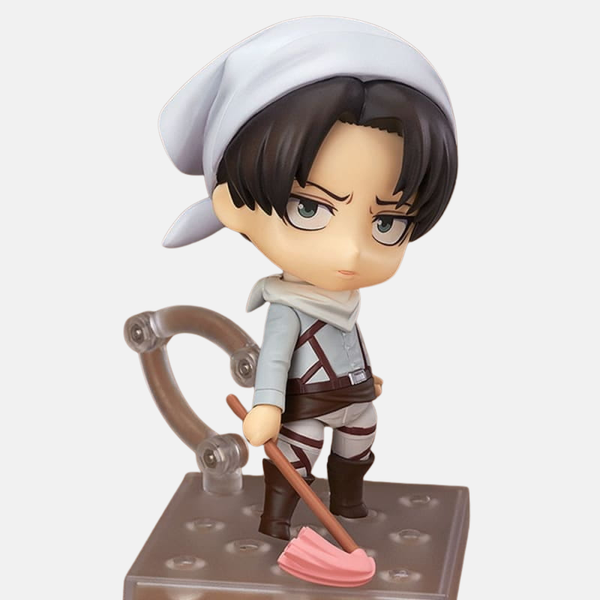 Nendoroid de Livaï Ackerman en action de nettoyage, un plumeau dans chaque main et une expression déterminée, regardant vers le haut.