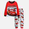 Pyjama enfant 2 pièces Lightning McQueen, haut rouge avec Flash et damier, pantalon blanc/gris à motifs.