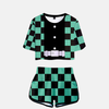 Ensemble pyjama femme Demon Slayer composé d'un crop top noir avec motif damier vert/noir sur les épaules/manches et d'un short assorti à motif damier vert/noir.
