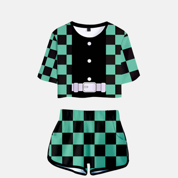 Ensemble pyjama femme Demon Slayer composé d'un crop top noir avec motif damier vert/noir sur les épaules/manches et d'un short assorti à motif damier vert/noir.