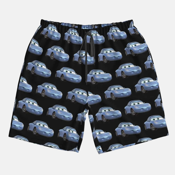 Gros plan sur le short de bain bleu pour femme avec un motif intégral de Sally Carrera.