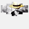 Tableau 5 pièces de la silhouette en noir et blanc de Monkey D. Luffy, qui ajuste son chapeau de paille.