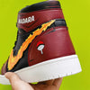 Vue arrière des baskets Madara Uchiwa, montrant les détails sur le talon de la chaussure.