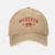 Casquette beige style "distressed" avec le logo brodé rouge "McQueen Est. 1977 Desert Racing".