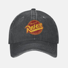 Casquette grise style "distressed" avec le logo Rust-eze brodé en orange et jaune au centre.