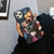 Coque pour iPhone avec une illustration du groupe de Tanjiro, Nezuko, Zenitsu et Inosuke de l'anime Demon Slayer.