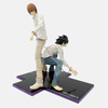 Figurine Death Note - Vue de profil accentuant la tension entre Kira et le détective L