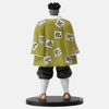 Gros plan sur le visage balafré et les yeux blancs de la figurine Gyomei Himejima.