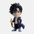 Figurine vinyle de Sung Jin-Woo de Solo Leveling en tenue de combat, tenant une dague d'énergie.
