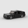Kit de construction d'une BMW M3 E30 noire en briques, montrant la vue de trois-quarts avant.