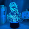 Vue de la lampe Nanami éclairée en bleu cyan, fond clair