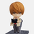 Mini-figurine Light Yagami assis lisant le Death Note - Chibi style 10cm