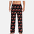 Pantalon pyjama noir pour homme avec un motif intégral de Flash McQueen et sa voiture de course rouge.