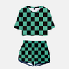 Ensemble pyjama femme Demon Slayer composé d'un crop top et d'un short assorti, arborant le motif damier vert et noir du haori de Tanjiro Kamado.