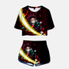 Ensemble pyjama femme Demon Slayer composé d'un crop top noir avec design de Tanjiro et d'un short assorti à motif damier vert/noir.