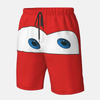 Short de bain rouge avec le visage de Flash McQueen (yeux et sourire) imprimé sur le devant, avec cordon de serrage noir.