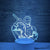 Lampe LED bleue Zoro en vue de profil, ambiance nocturne